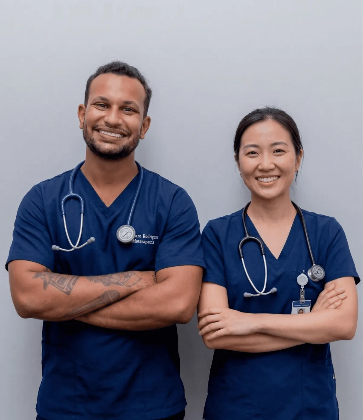 man in blue crew neck t-shirt smiling