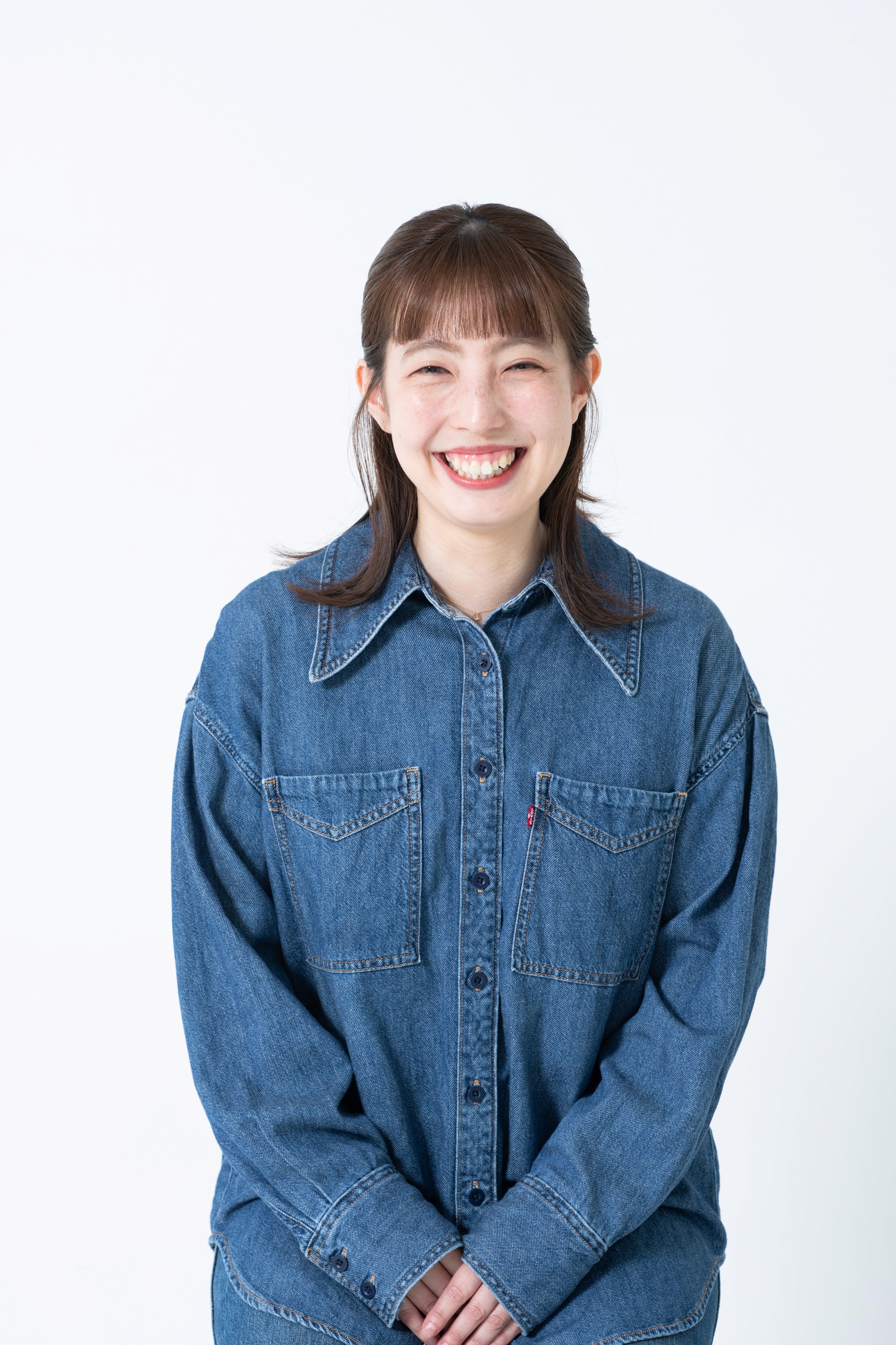 woman staring in the sky while smiling