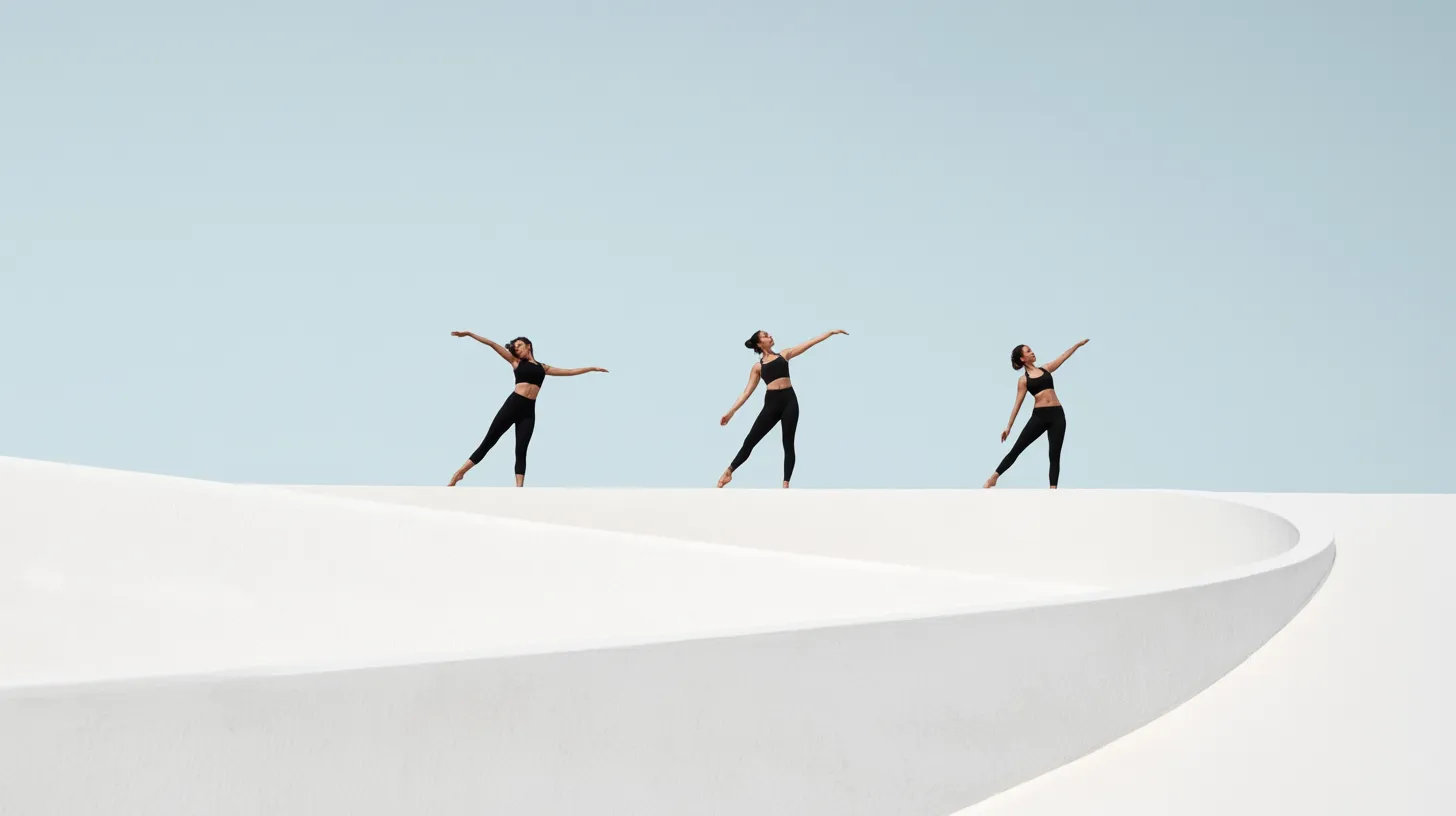 Three Dancers Posing on White Curved Structure
