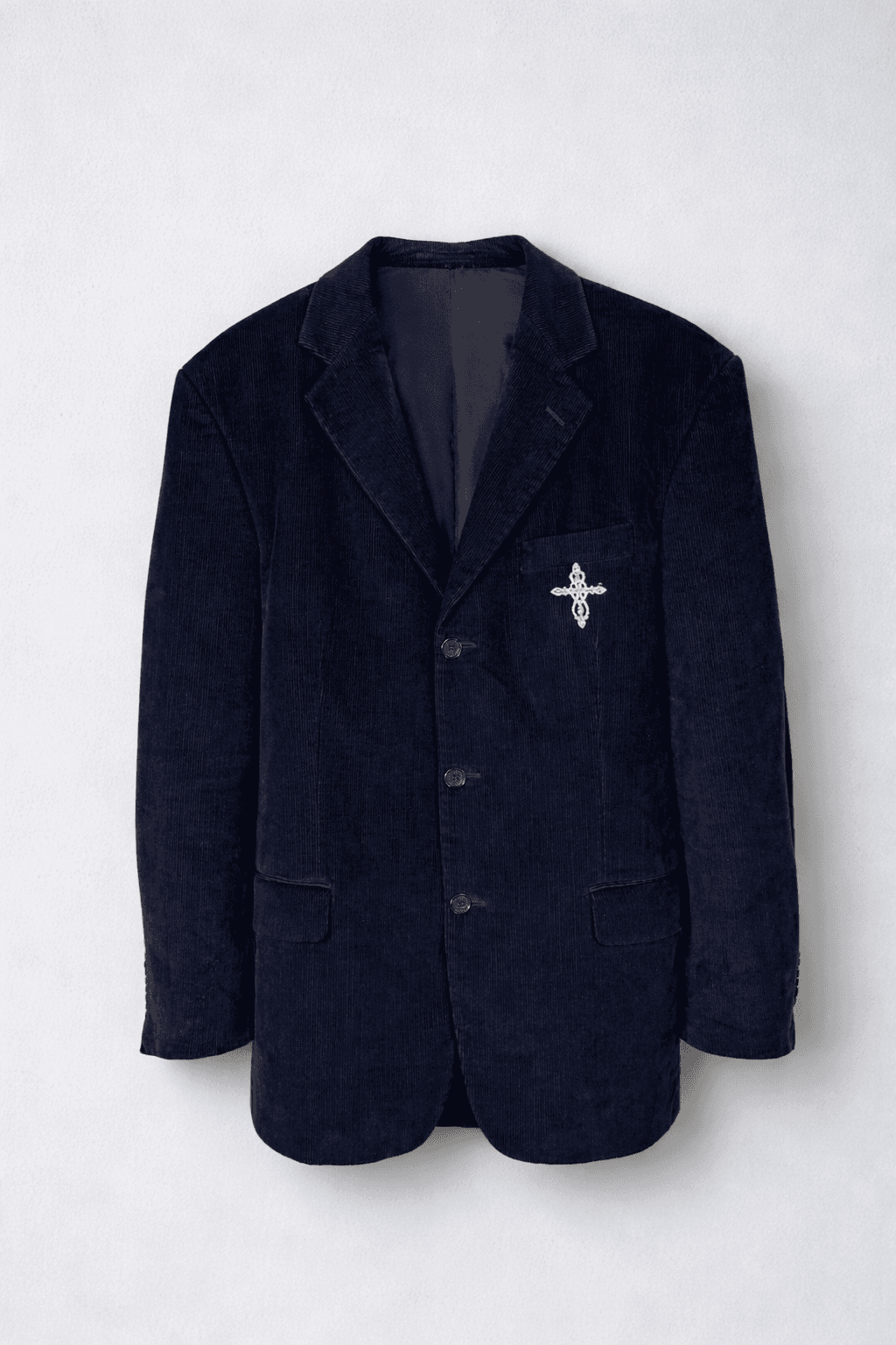 Navy corduroy blazer with decorative pin