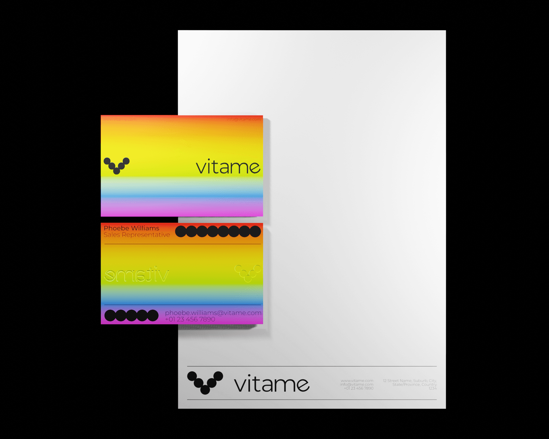 A mockup of Vitame's letterhead and business card designs. The business cards feature a vibrant rainbow gradient background with the logo and contact details shown in black. The letterhead features the logo and contact details in black on the bottom of the page, placed against a plain white page.