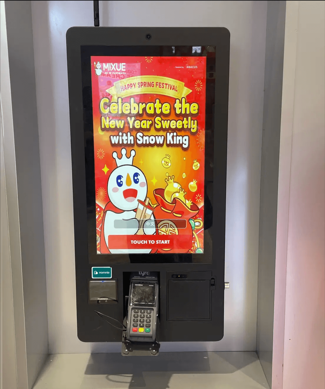 wall mounted kiosk at mixue