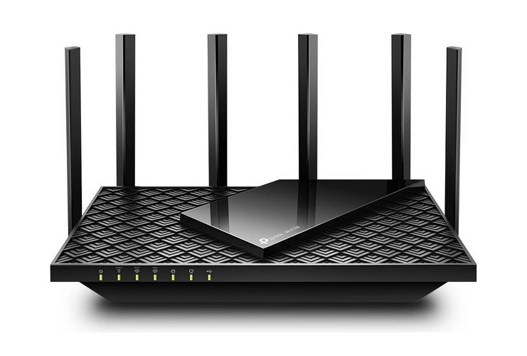 Sort TP-Link router med seks antenner og LED-indikatorer.