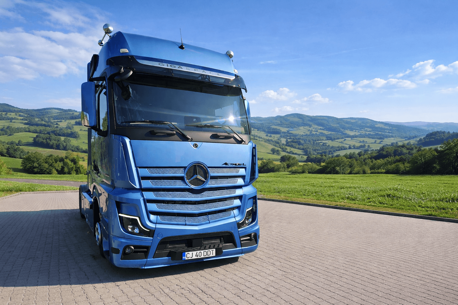 Truck on the road with stunning landscape