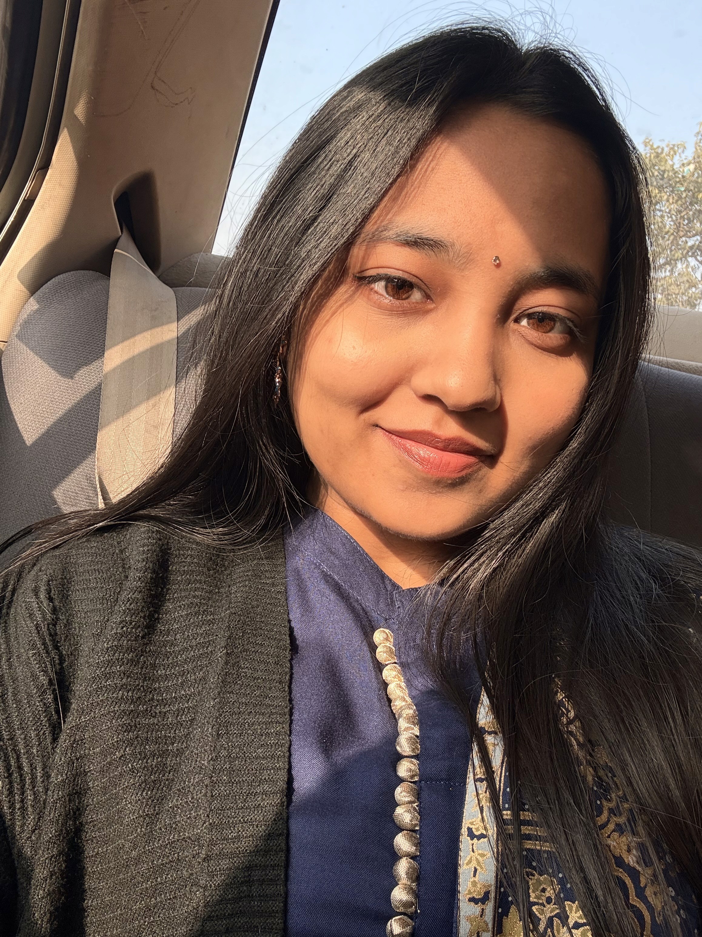 Black and white portrait of a man with a beard and glasses