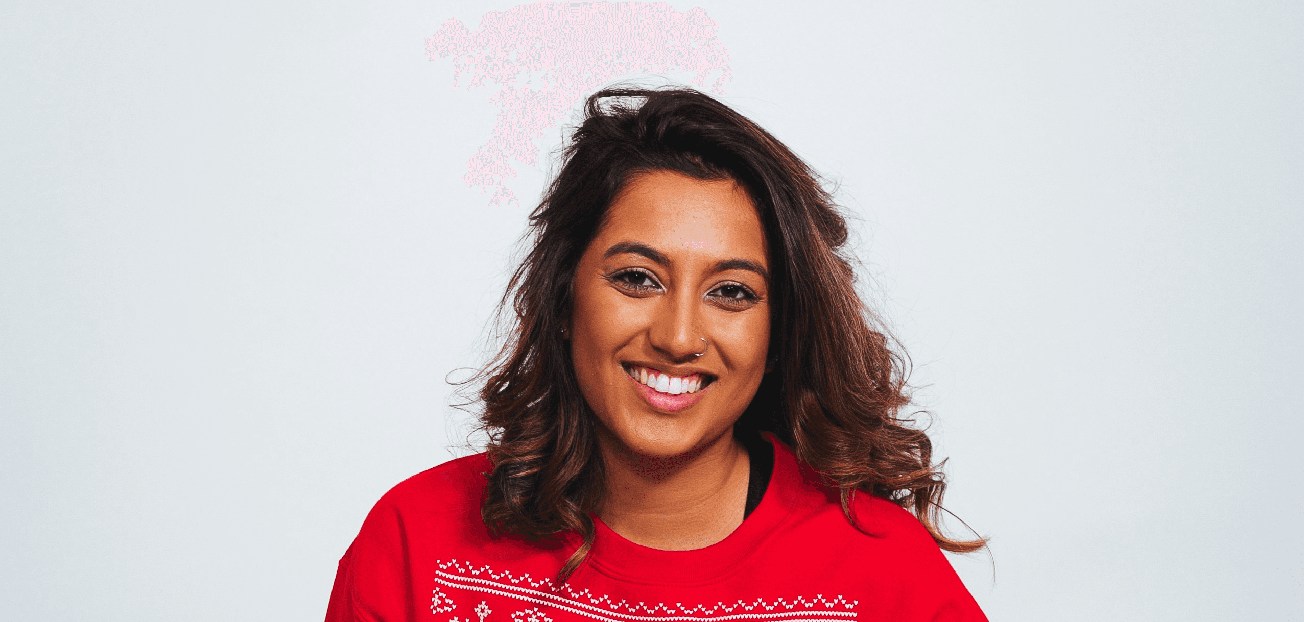 woman in red sweatshirt and black pants