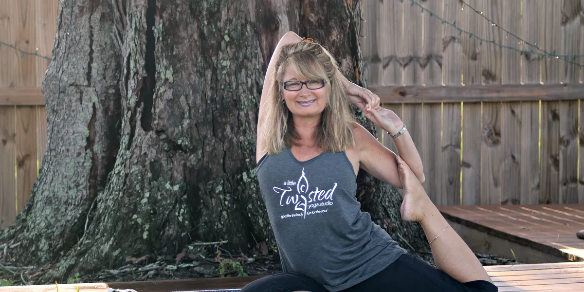 a woman in a yoga pose bradenton