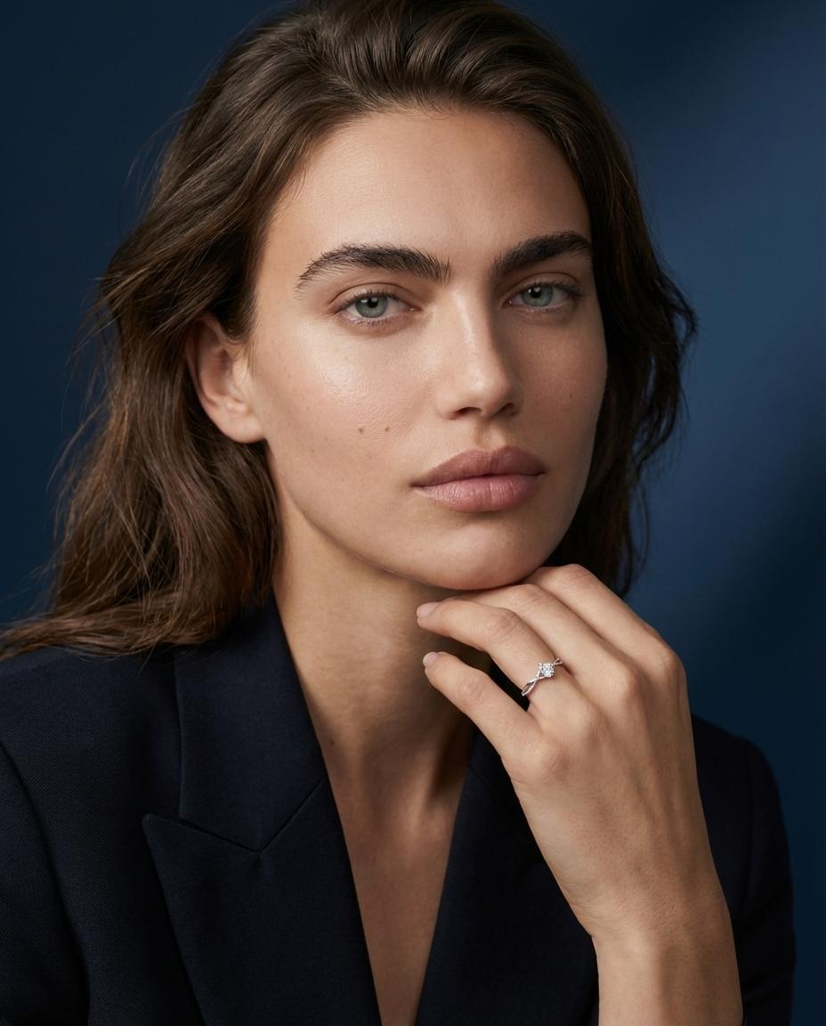 Mila Kovač AI model wearing gold ring, close editorial portrait, dark cinematic background, Gemzy AI jewelry studio