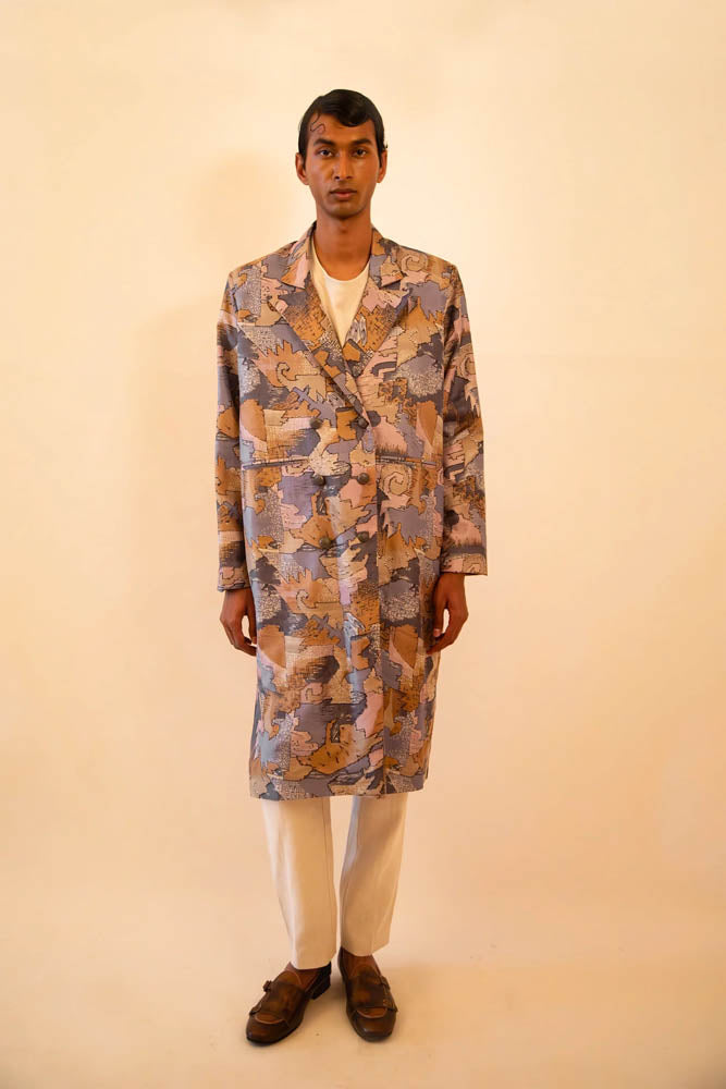 Ved is our one-of-a-kind double-breasted silk trench coat, handcrafted by skilled artisans in-house using a vintage silk sari.