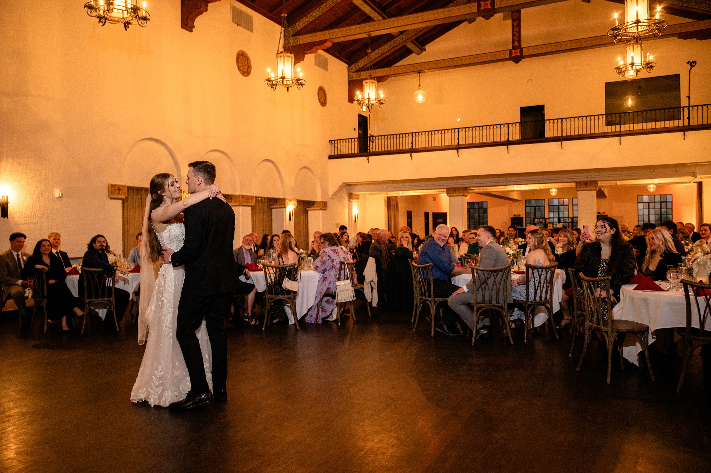 Flat lay wedding details with bouquet, rings, and sparkling bridal heels
