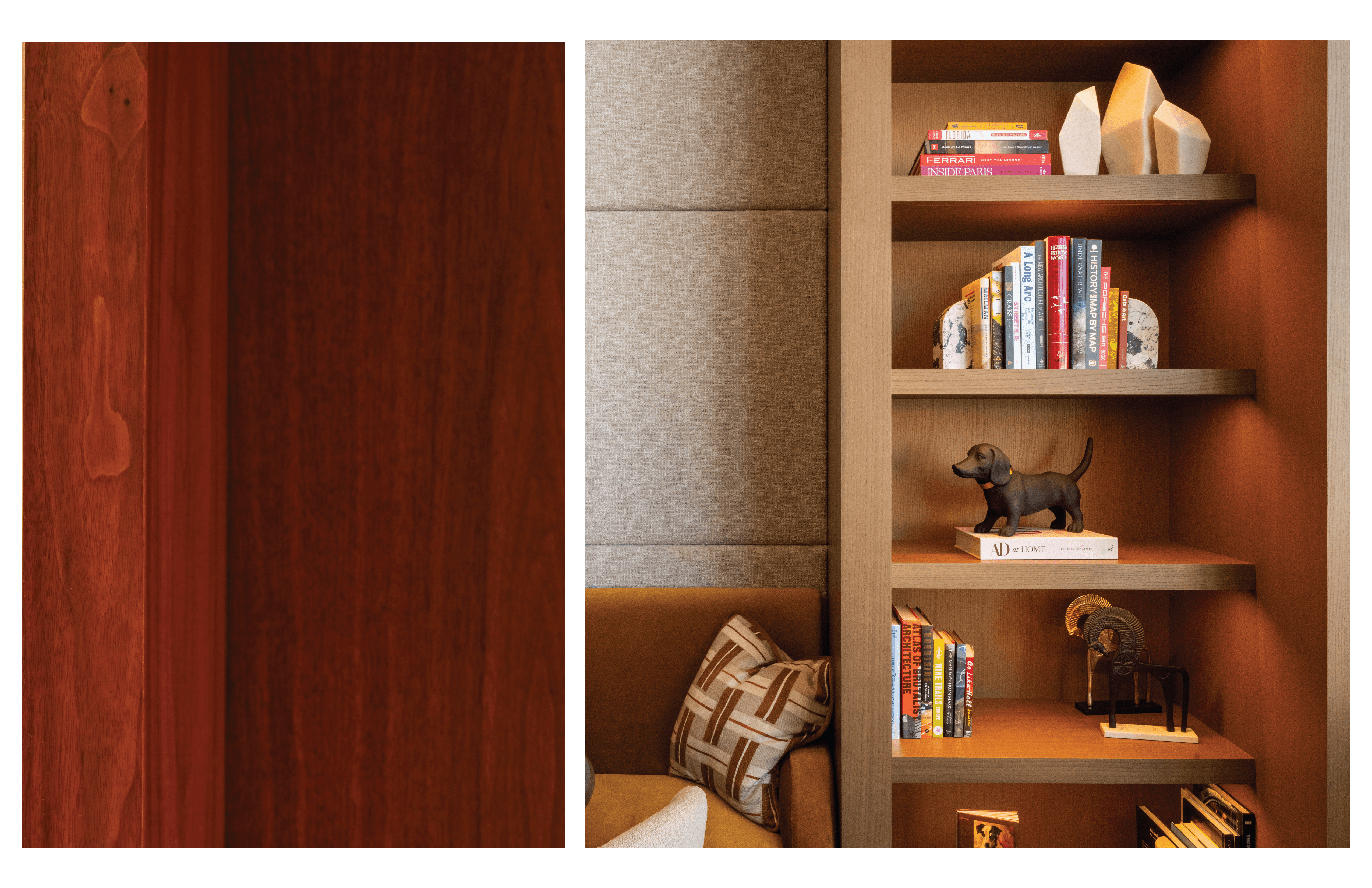 A stylish room with dark walls, featuring modern pendant lights, a wooden table, and cozy seating arrangements.