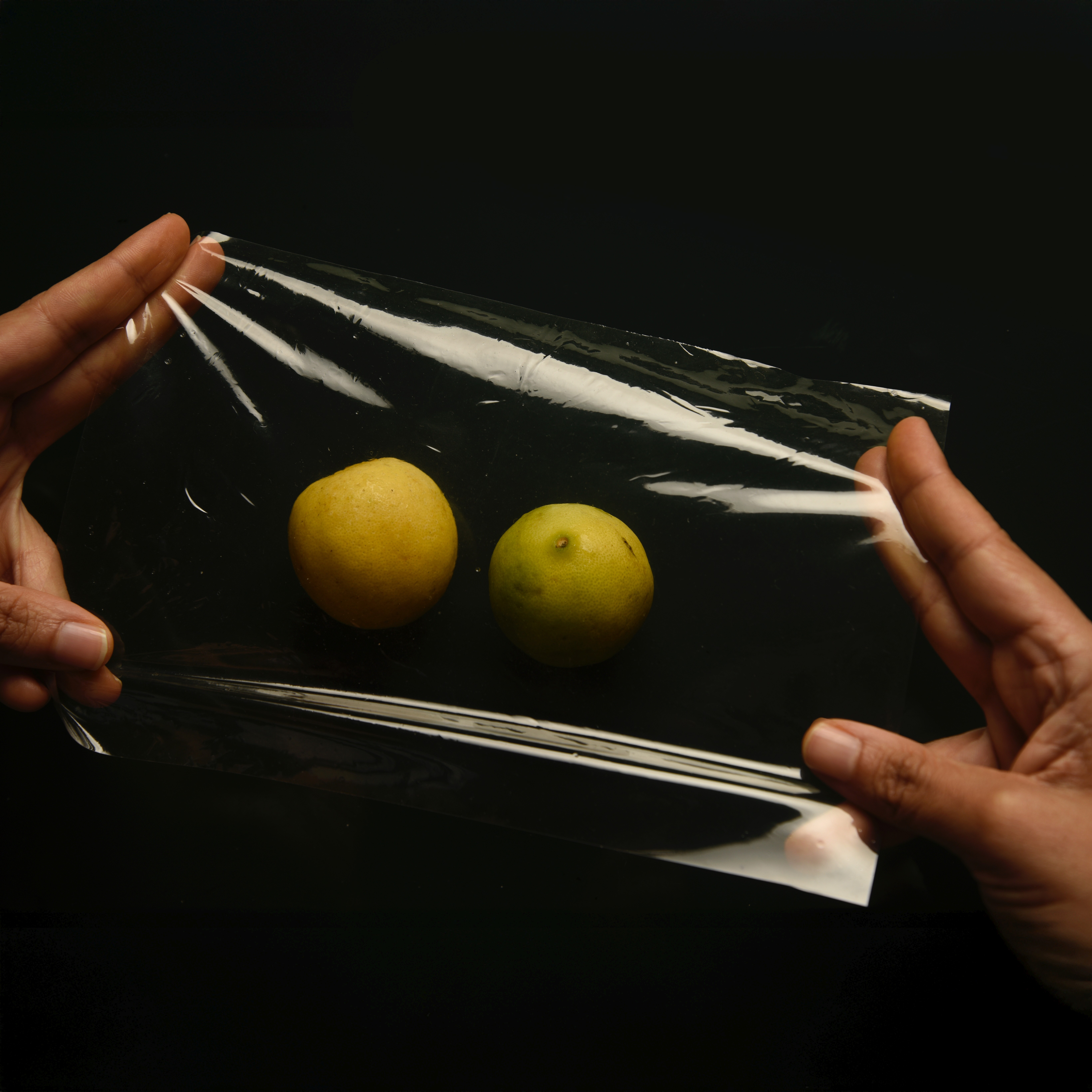 Farm fields with barn and mountains in background
