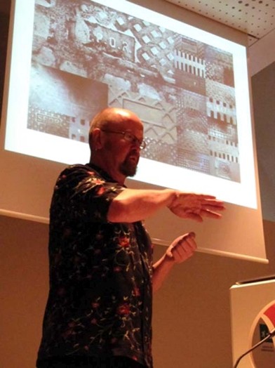 a man with a patterned t-shirt