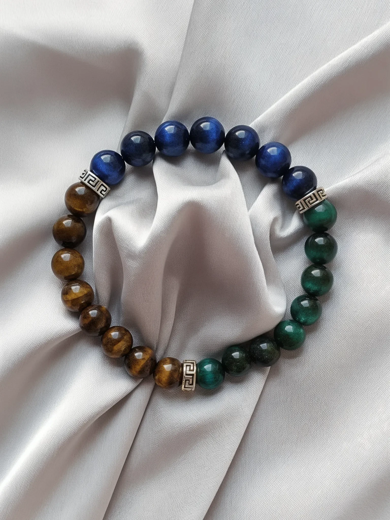 Bracelet placed on a fabric setting.