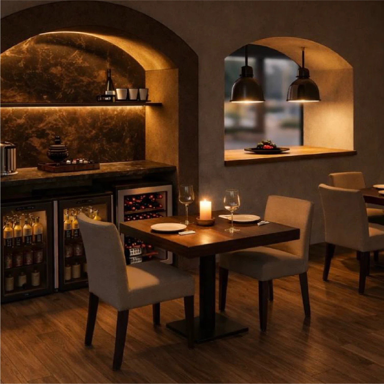 Vineyard with tables and chairs overlooking mountains.