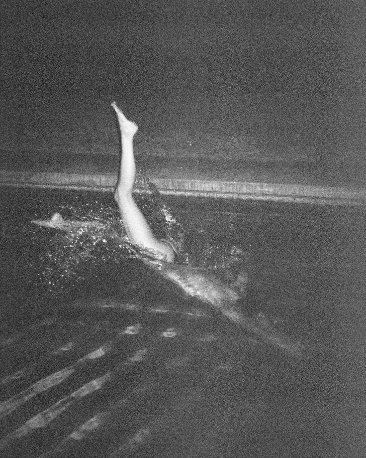 woman diving into pool