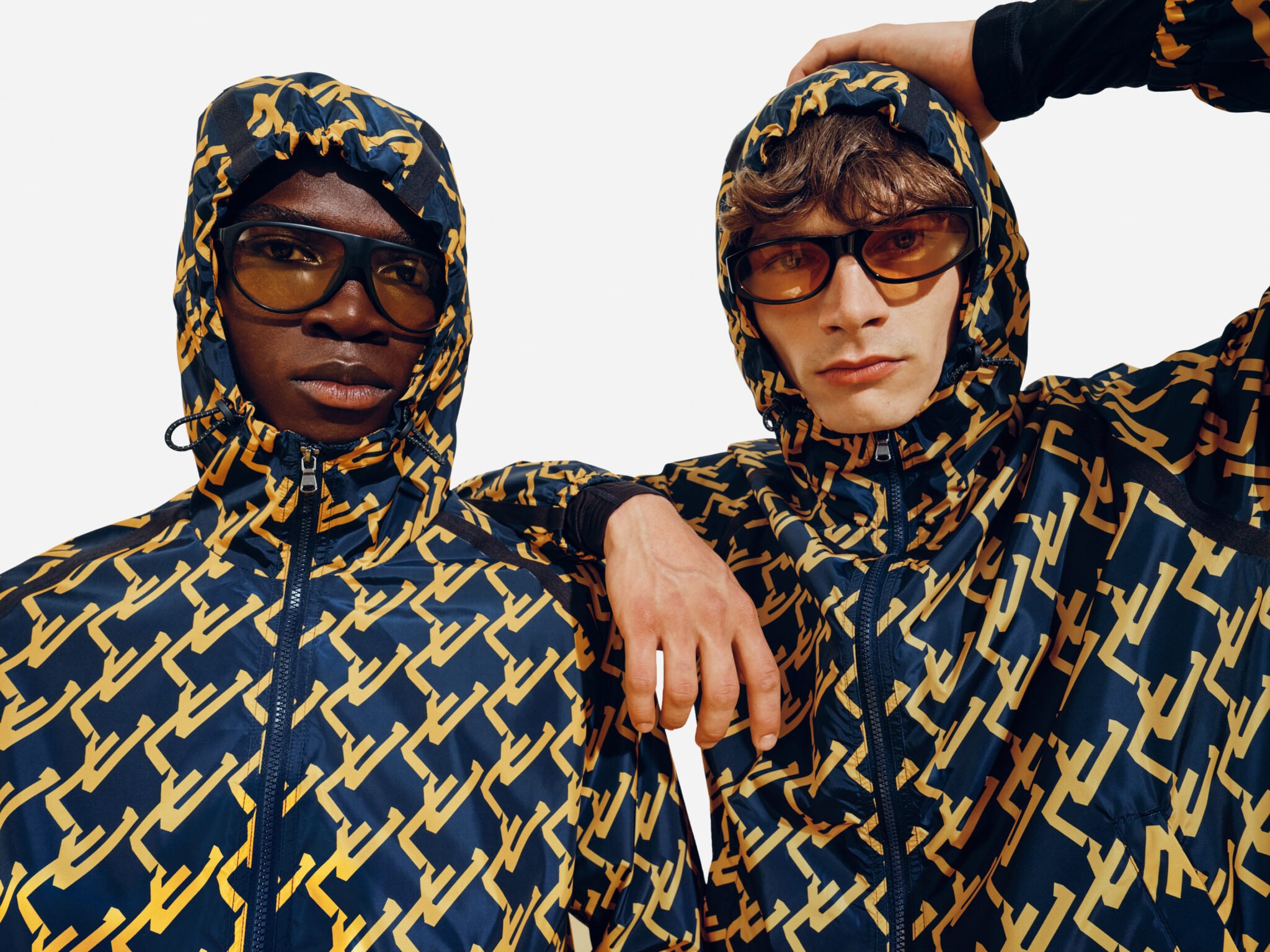J.Lindeberg SS22 campaign, models in navy and yellow patterned jackets