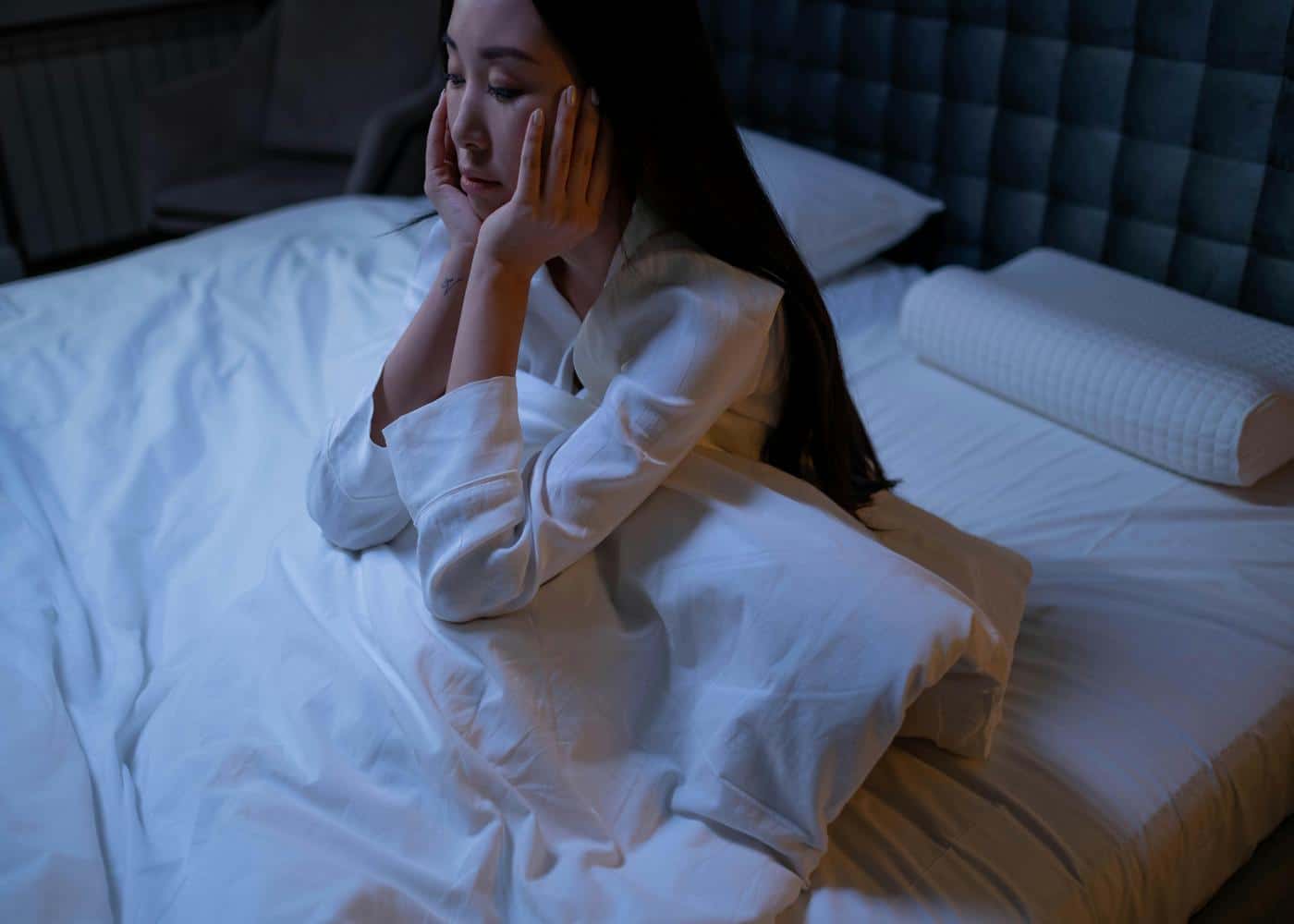 Yoga Nidra and Insomnia - Woman struggling to sleep
