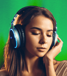 Young woman enjoying music with large headphones, illustrating the personalized and immersive audio experience provided by the Sunora AI Music Generator app