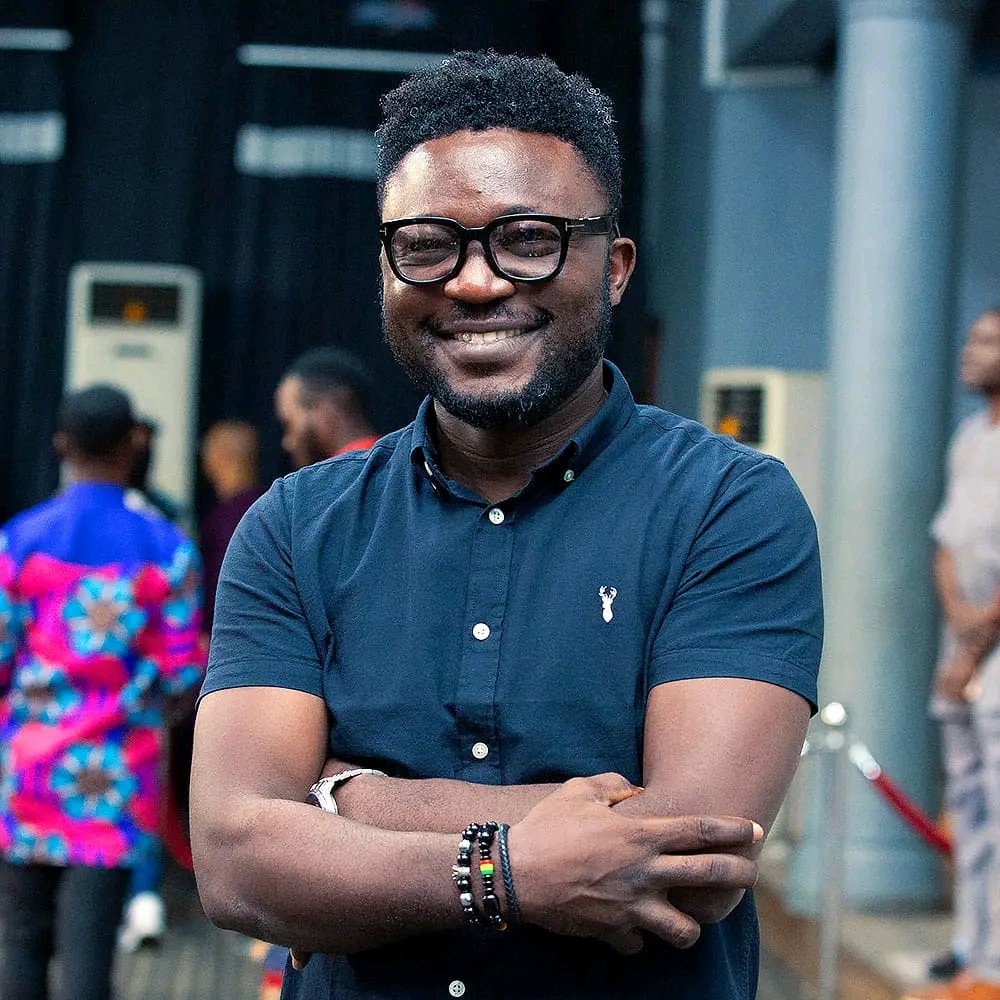 a group of people walking on a sidewalk