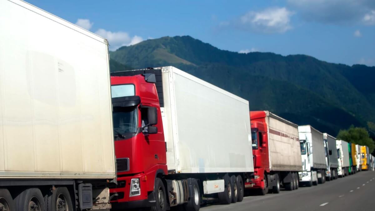 Truck delayed at a European border checkpoint, highlighting challenges in freight capacity.