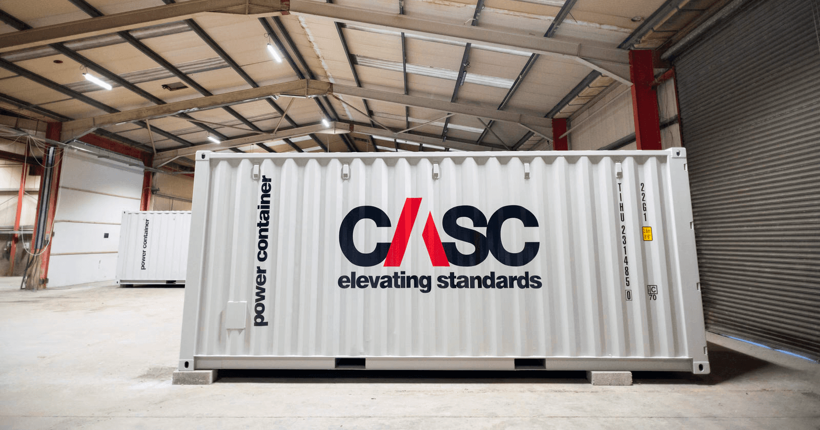 CASC-branded power container inside an industrial warehouse