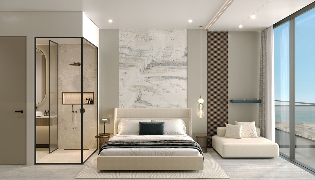 Modern bedroom featuring a large window with a view of the ocean, designed by Trio Isle by Durar.