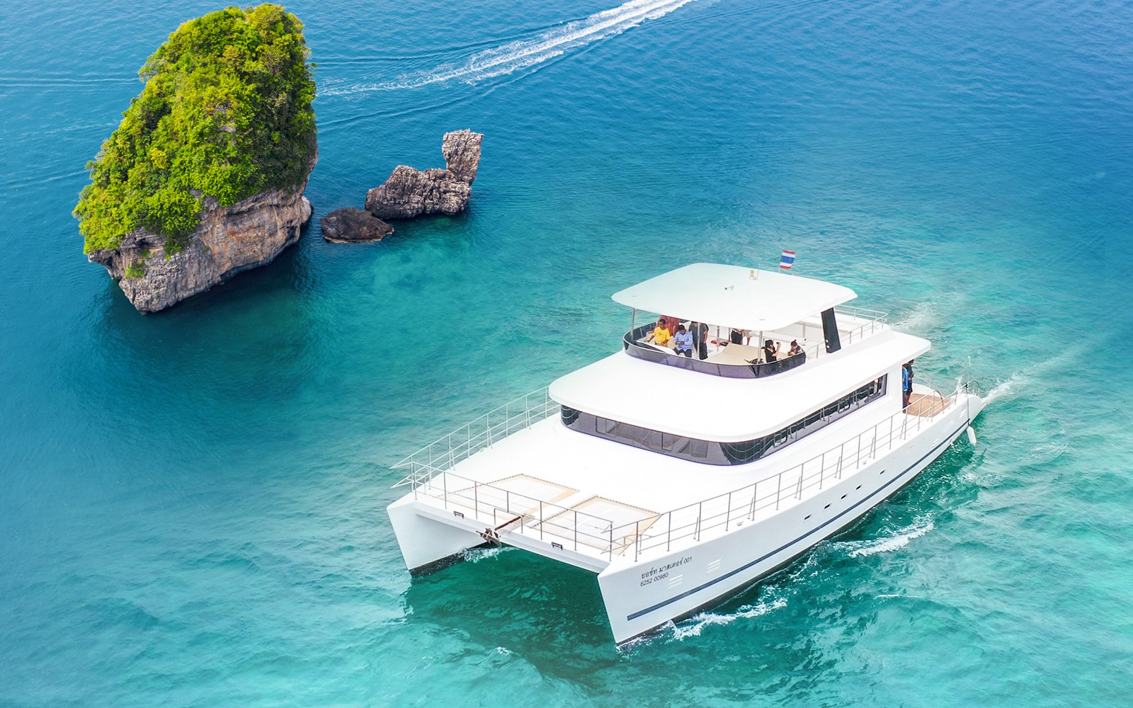 Premium yacht cruising near limestone island in Phuket on James Bond Sunset Tour.