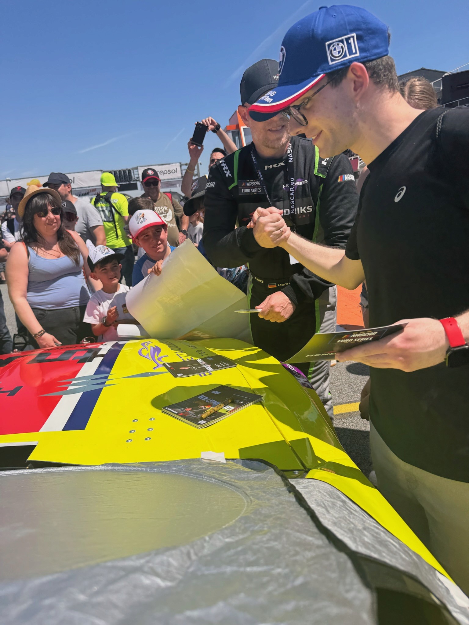 Henrik Peters sharing a moment with fans at the racetrack