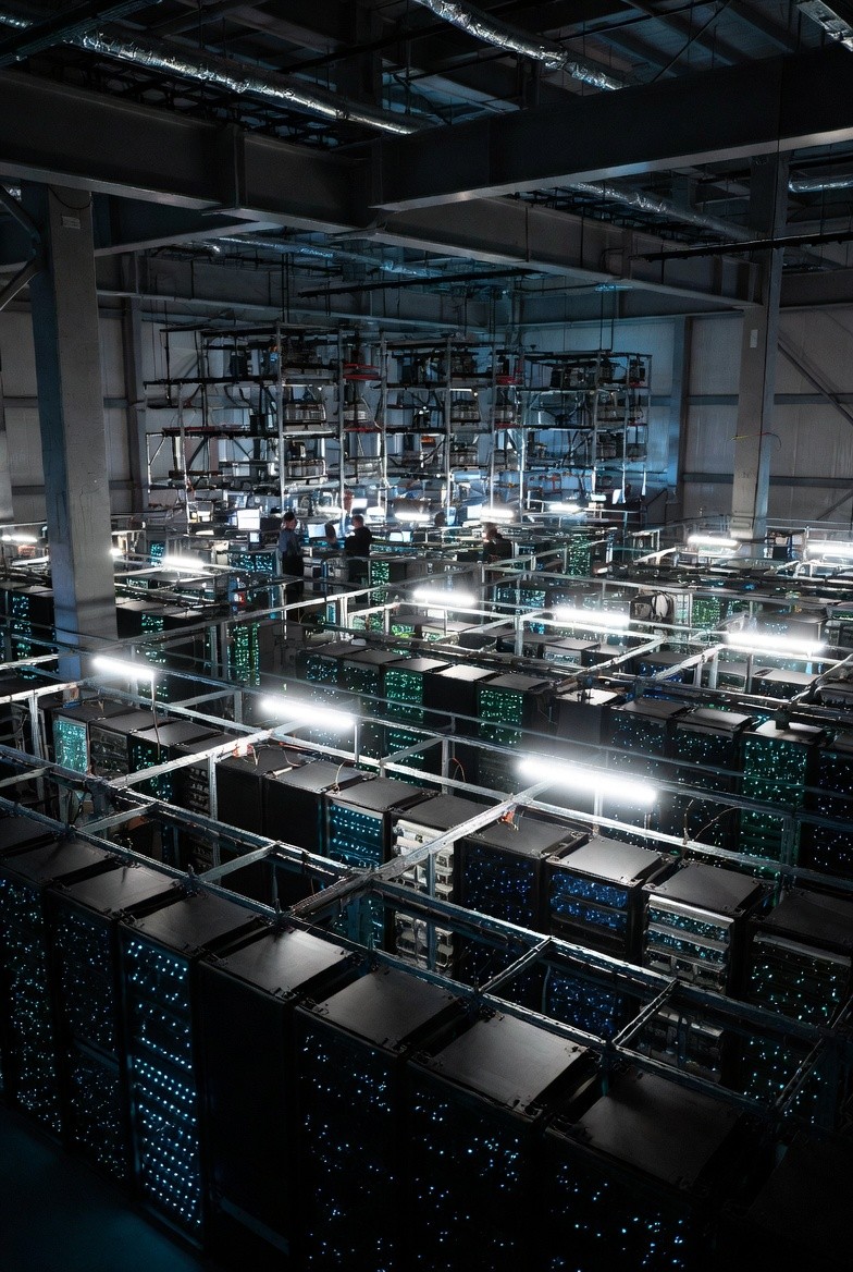 Modern glass building reflected in angled grid lines