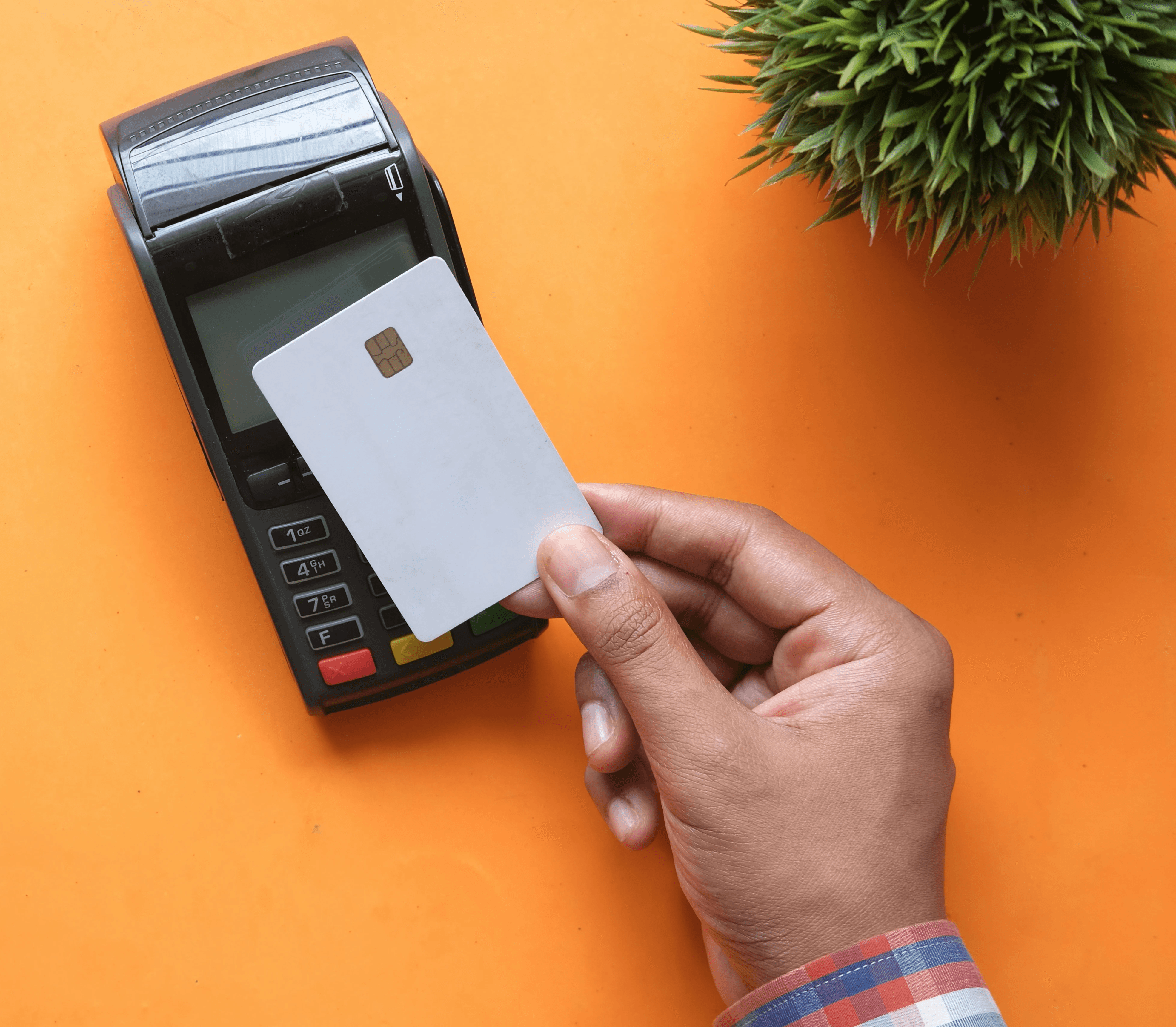 person holding black and white electronic device