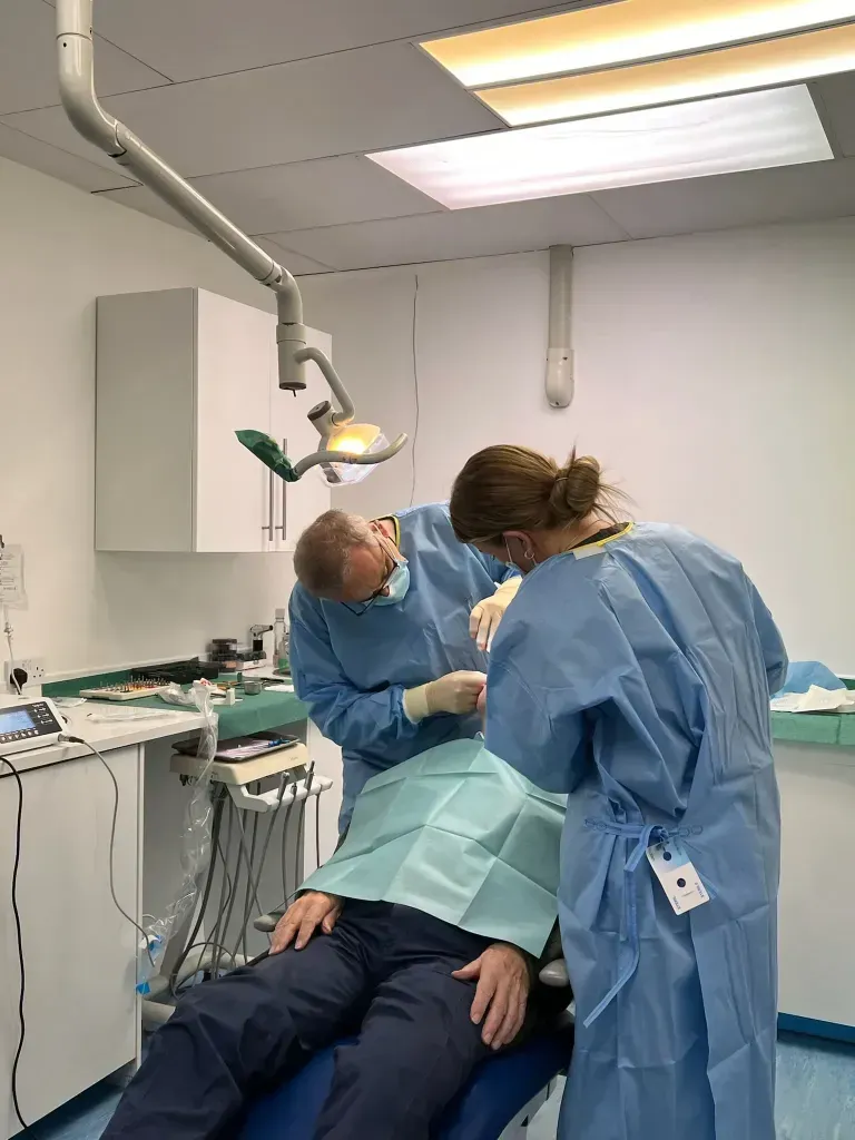 Dr Yasser and his nurse in surgery.
