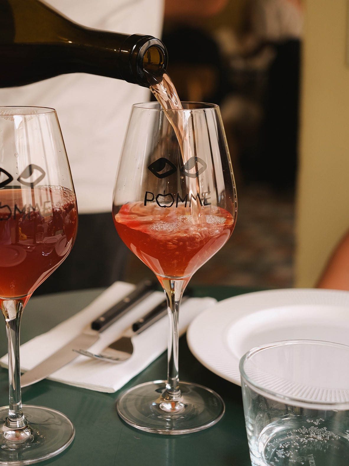Wine being poured into a glass
