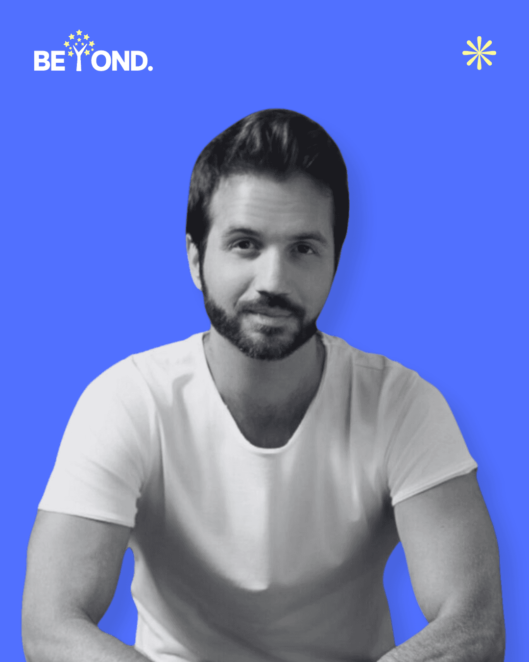 A confident person with short, styled hair and a leather jacket poses against a dark backdrop.