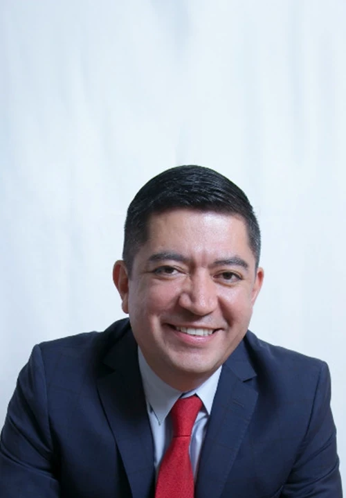 A portrait photo of Shane Riedman, VP and General Manager at Verisk