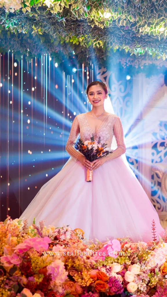 Bridal portrait amid blush florals at Stalla Suites, Quezon City