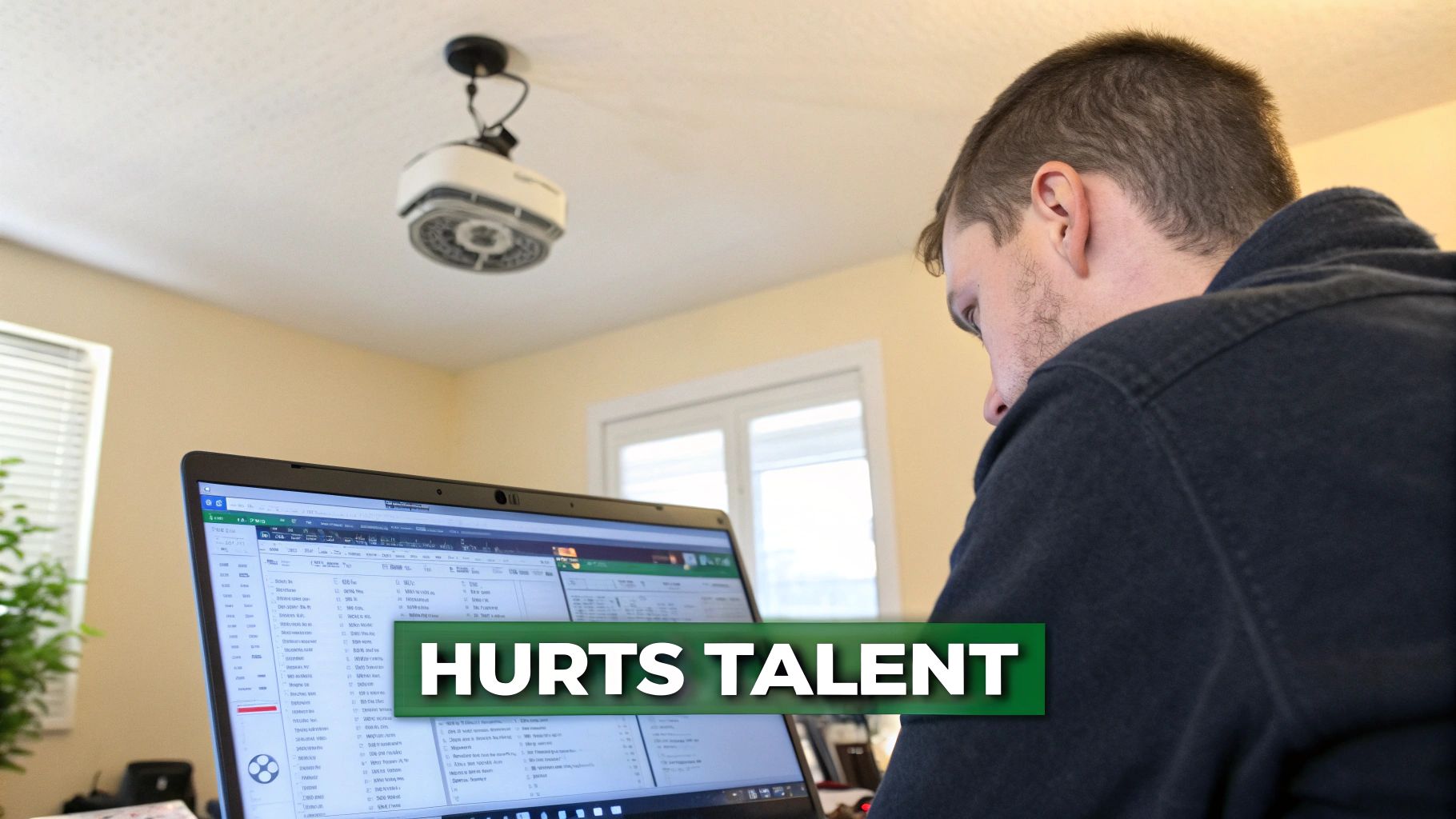 Developer at a computer looking stressed