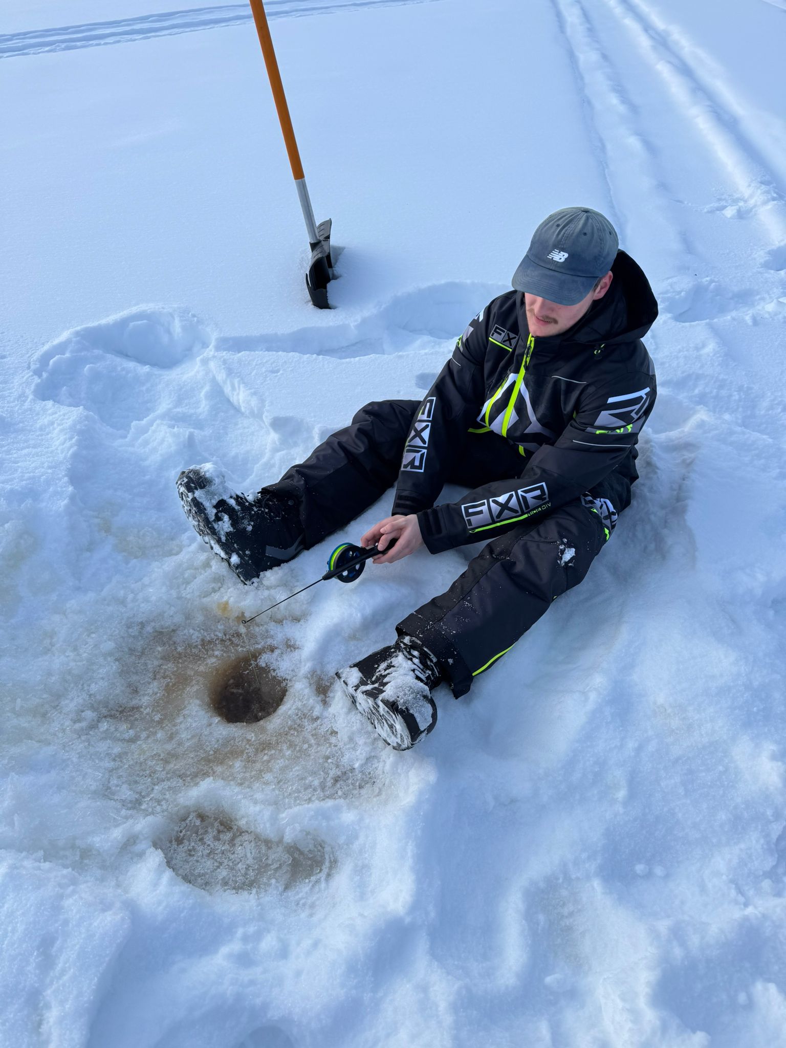 snow covered trees and road during daytime