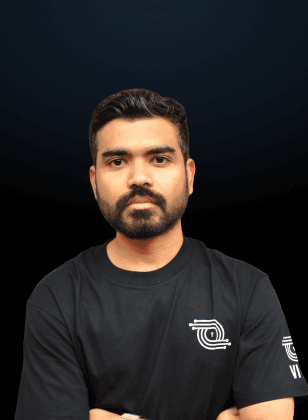 man standing near white wall