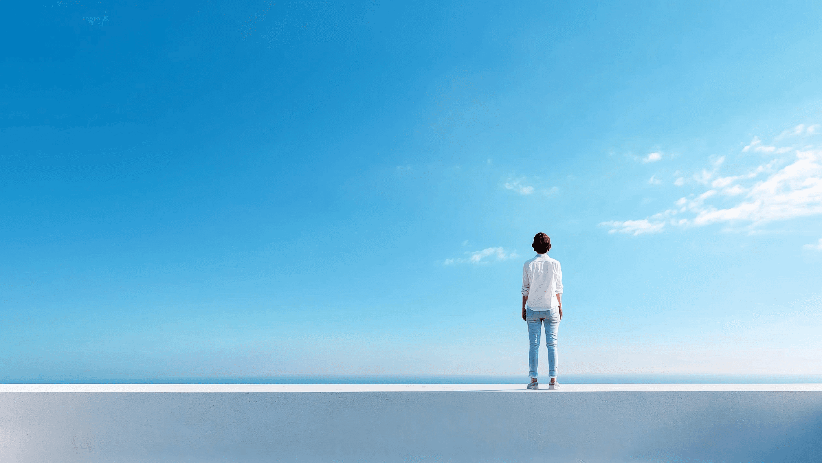kids lying on a glass land and smiling