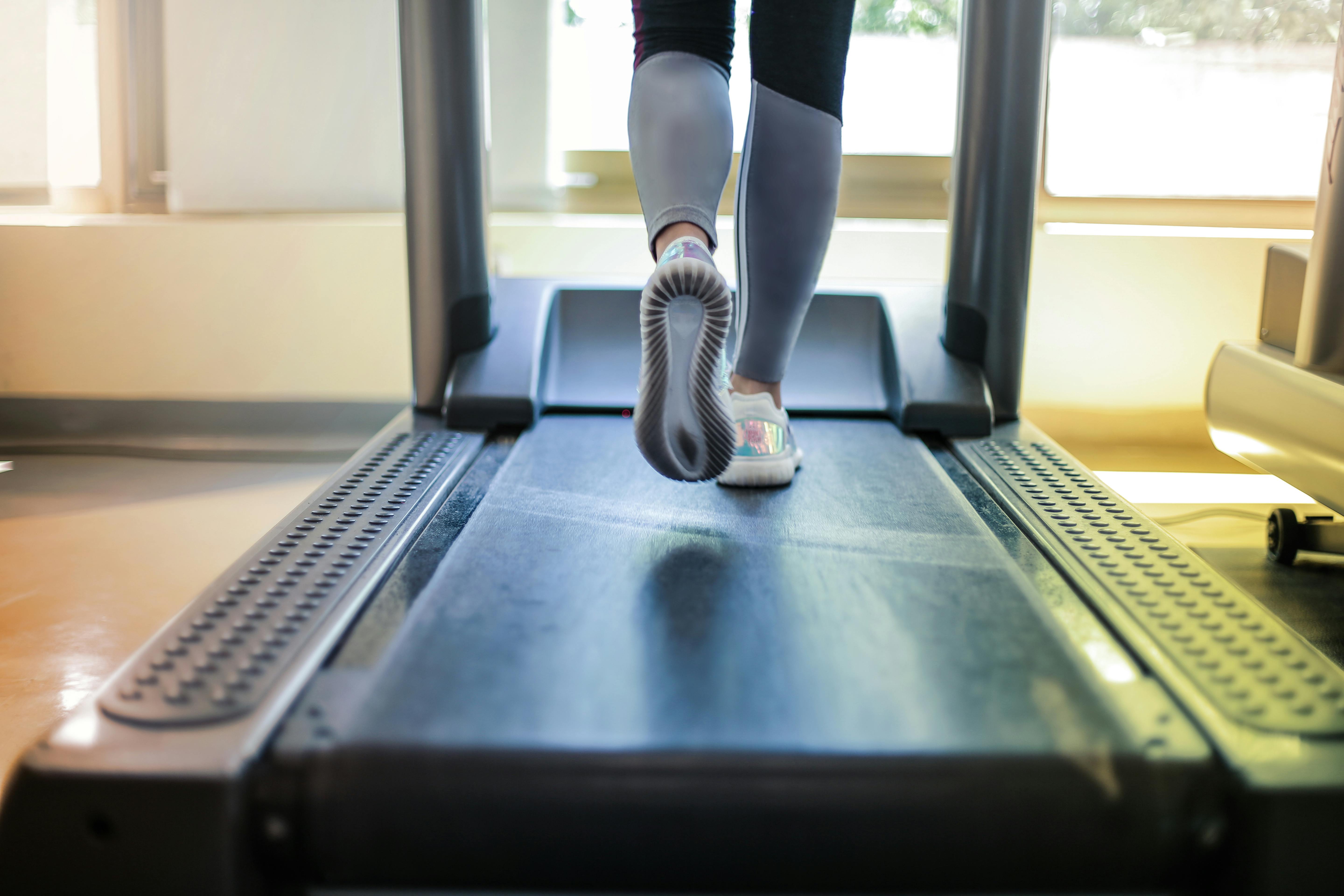 Close-up of running on a treadmill, highlighting fast emergency repair in Calgary.