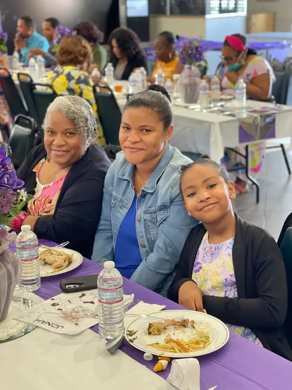 Church members enjoying fellowship together at Peace Apostolic Church