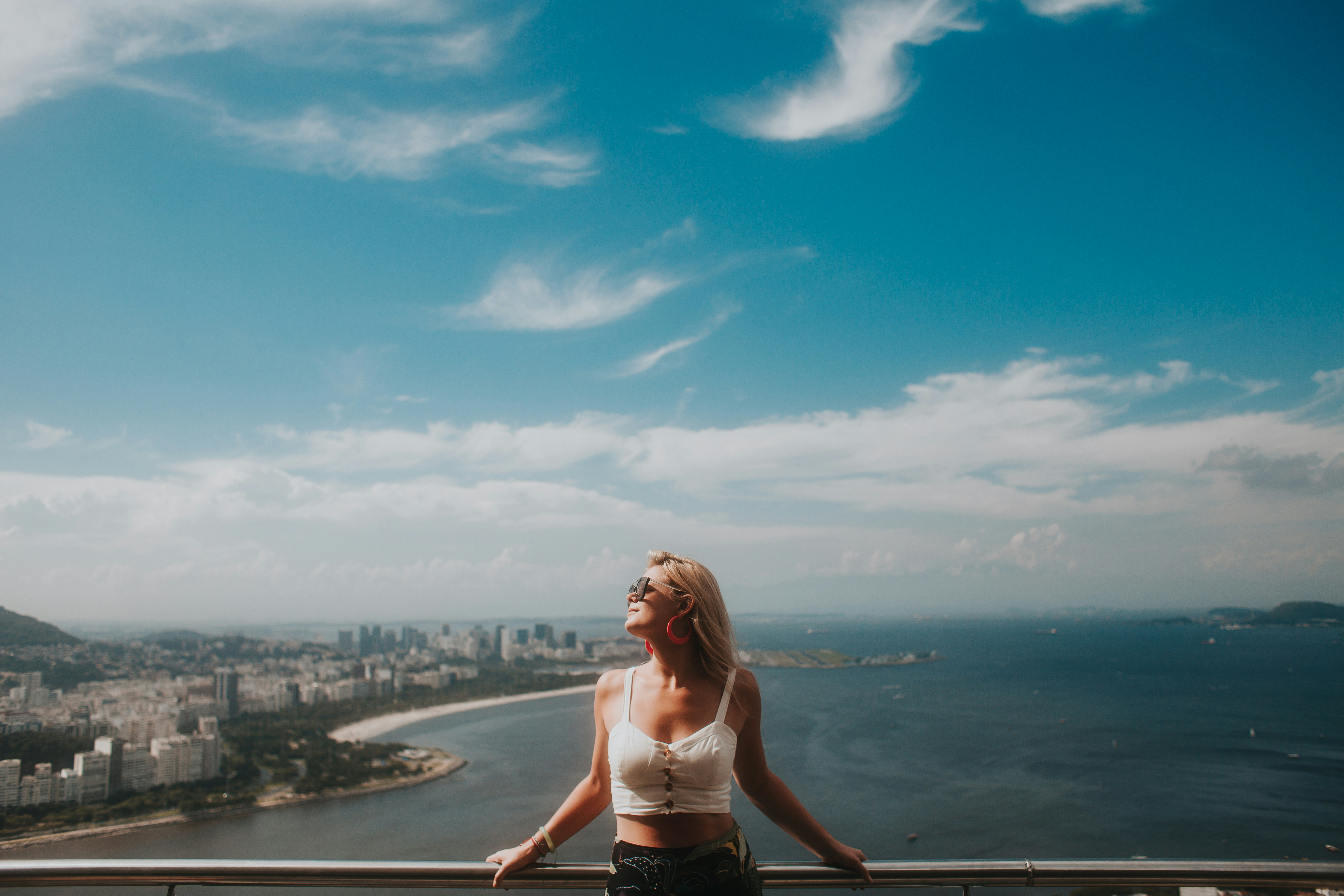 woman enjoying the weather - How To Glow Up Over The Summer