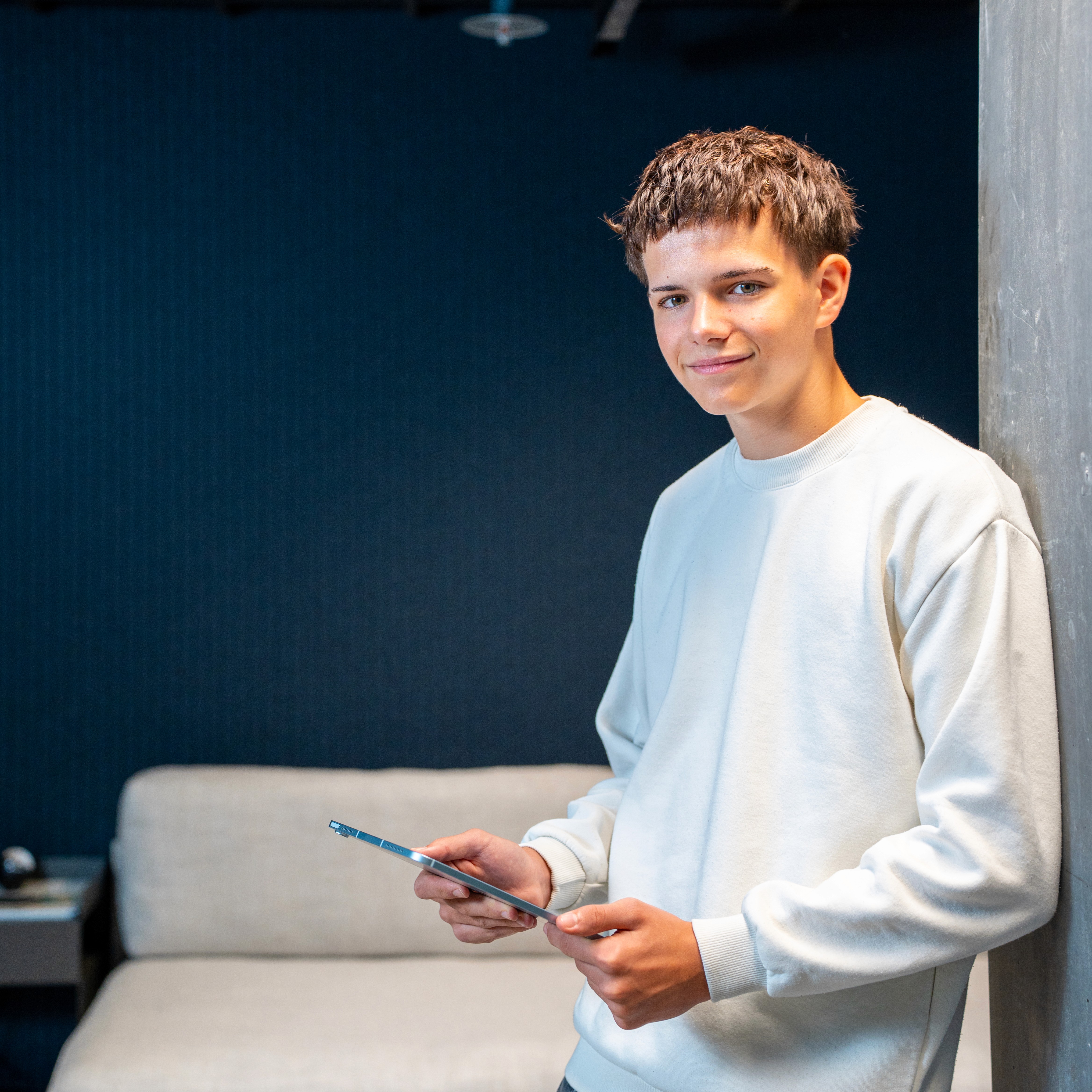Close-up of a tree stump showing growth rings and a textured brown wood surface.