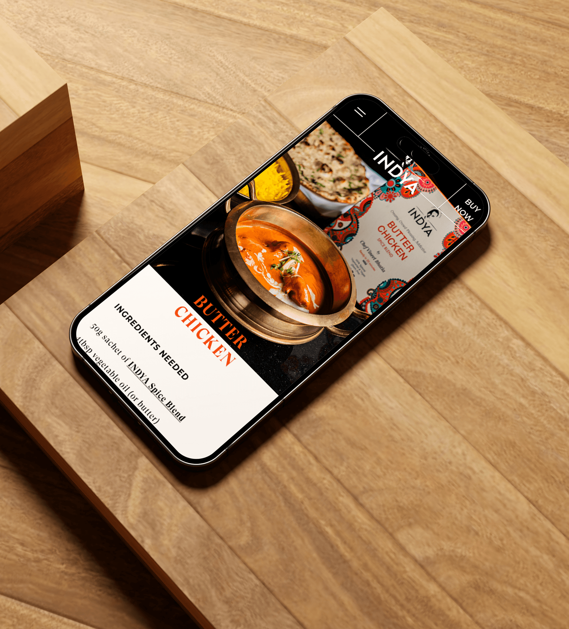 Mobile view of the INYA Spices website showcasing a Butter Chicken recipe with traditional Indian spices and ingredients. Experience the authentic flavors of Indian cuisine with INYA Spices.