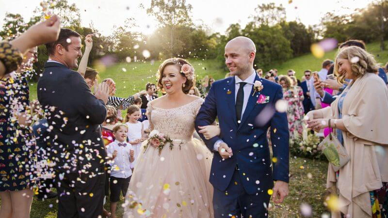 Bride & Groom walking down the aisle