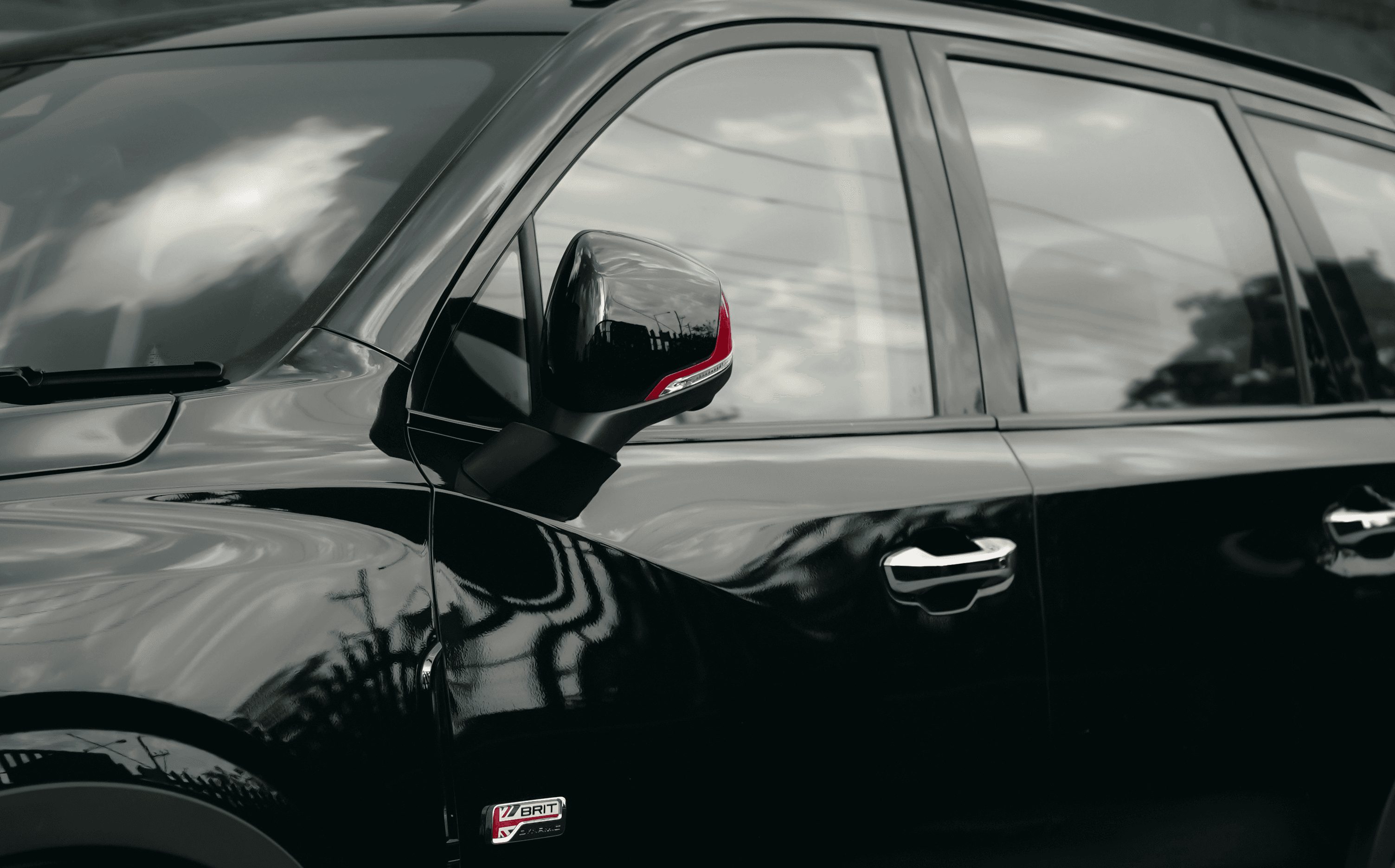 a close up of a car with a helmet on it