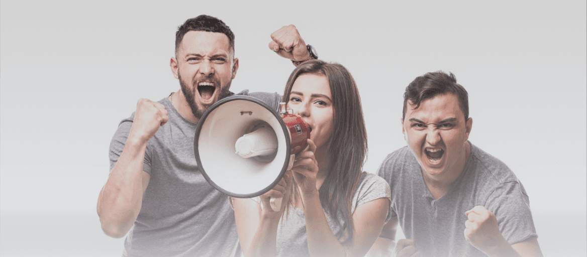 Three people cheering and shouting, with one using a megaphone to amplify the noise.
