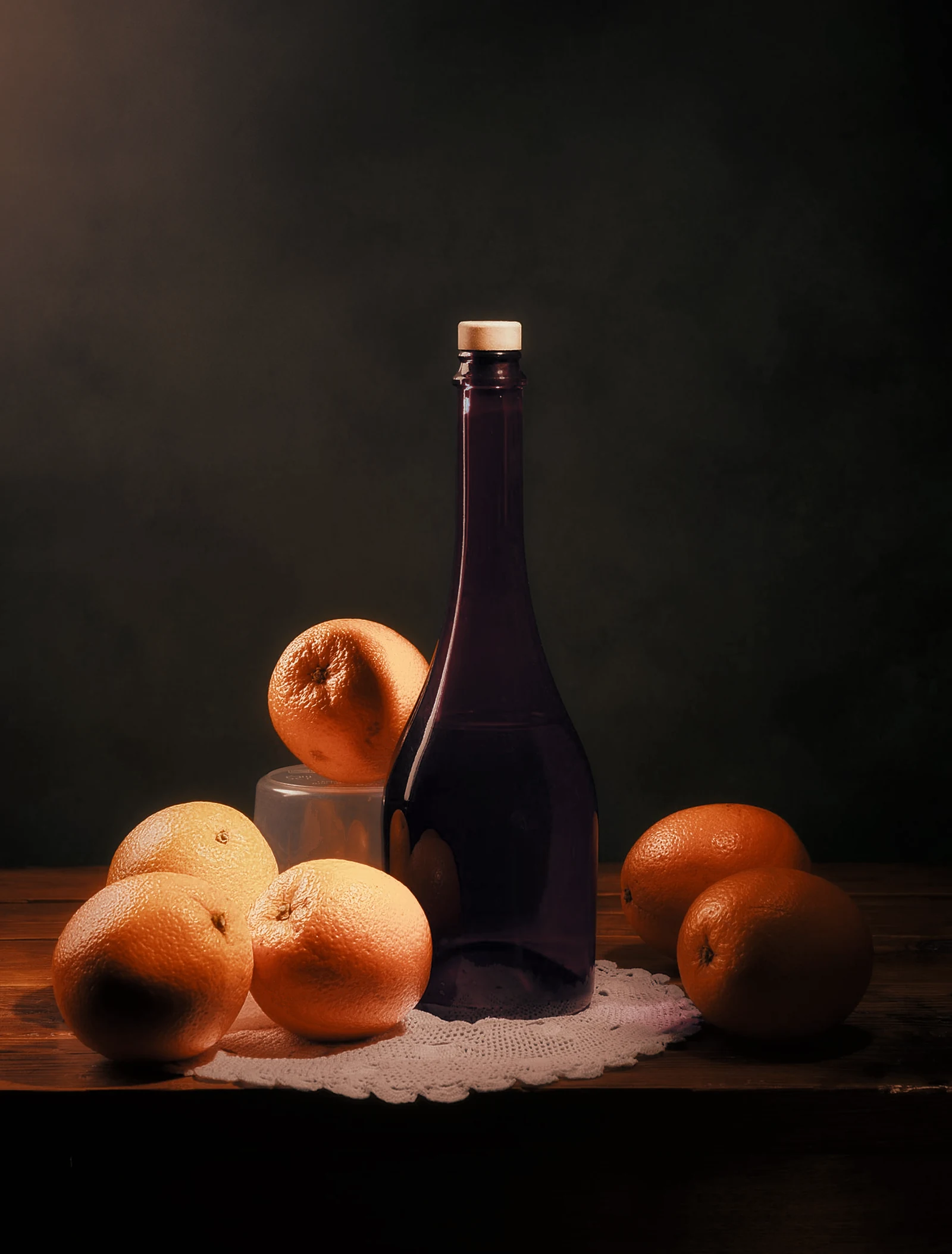 Still life of oranges and a blue bottle