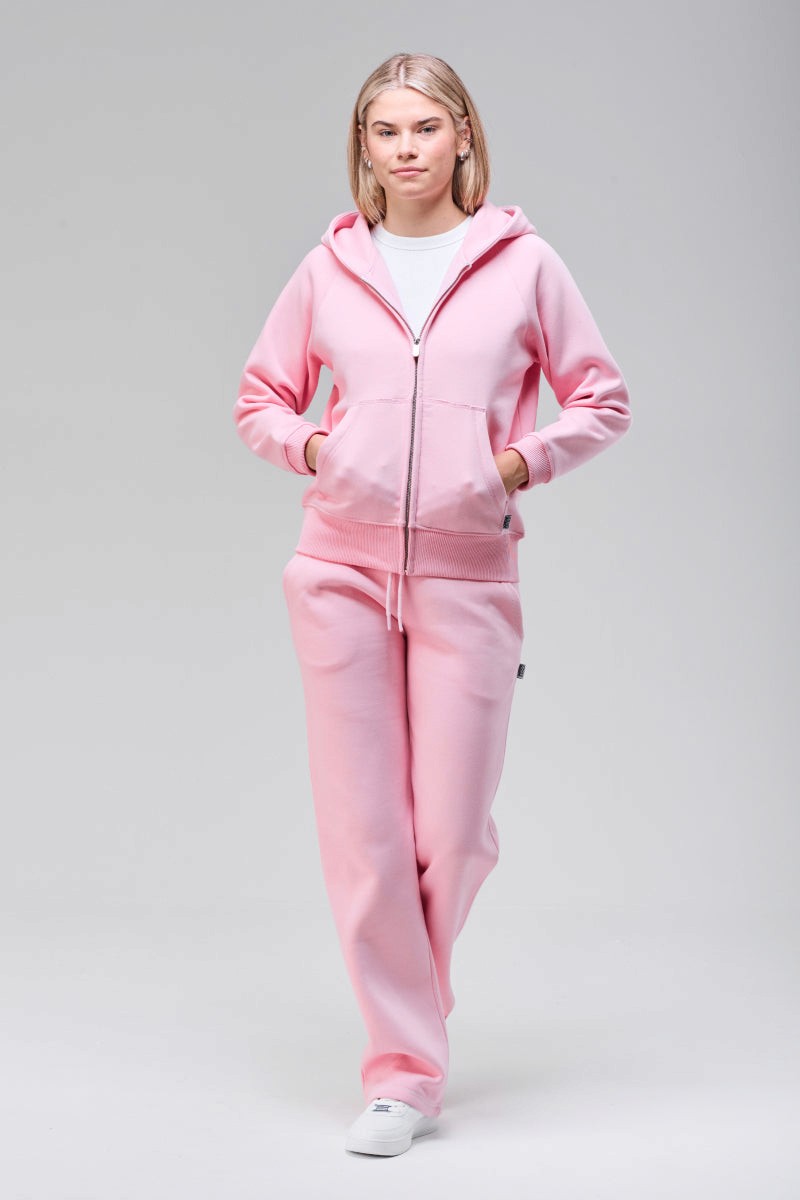 Sunday Superior Belmont Zip Hoodie in soft pink, walking pose front view